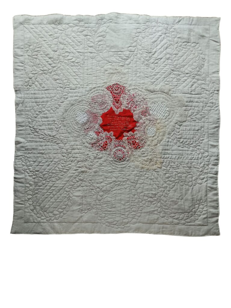 Hand quilted, hand pieced and hand embroidered wall quilt